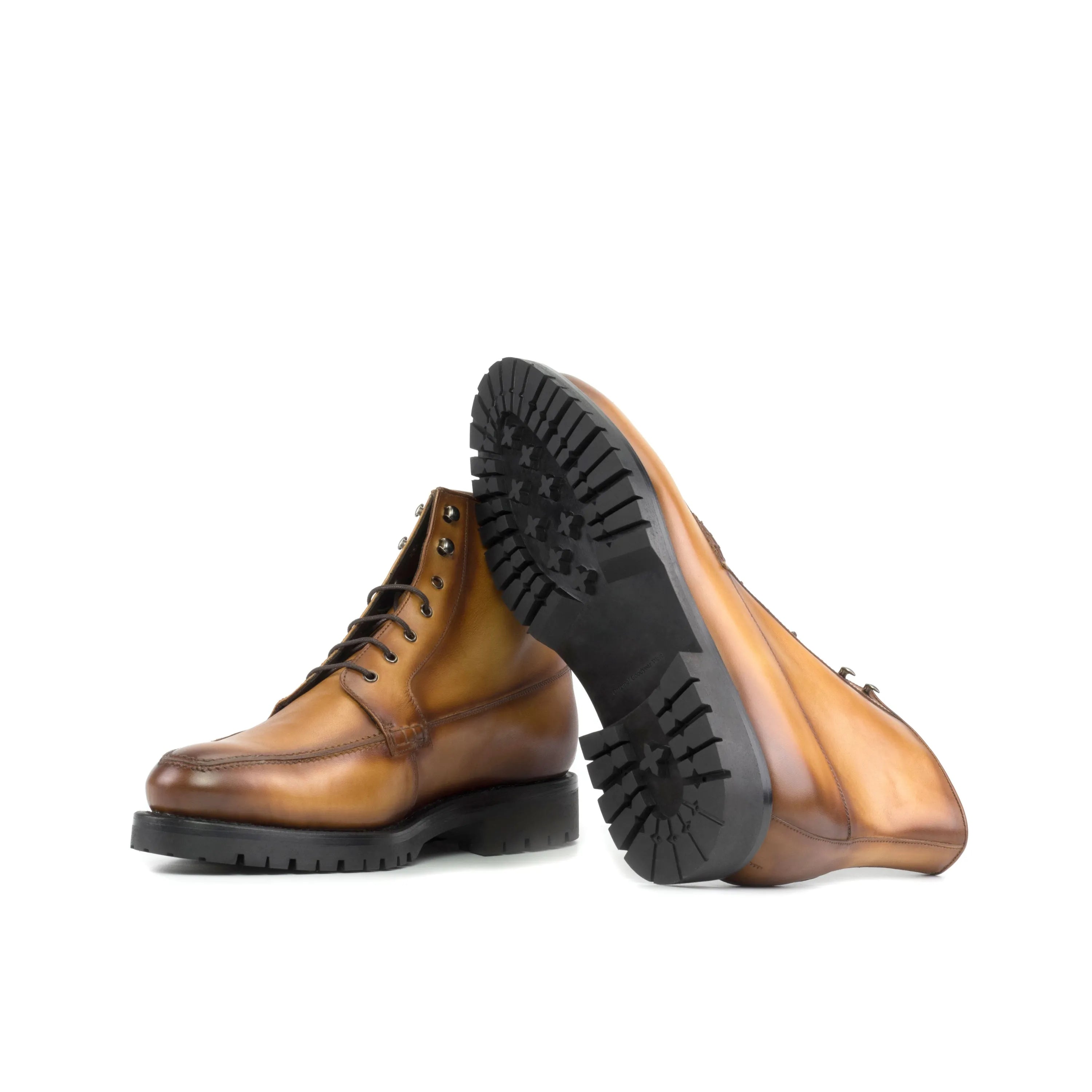 Pair of brown leather lug-soled Landon moc boots