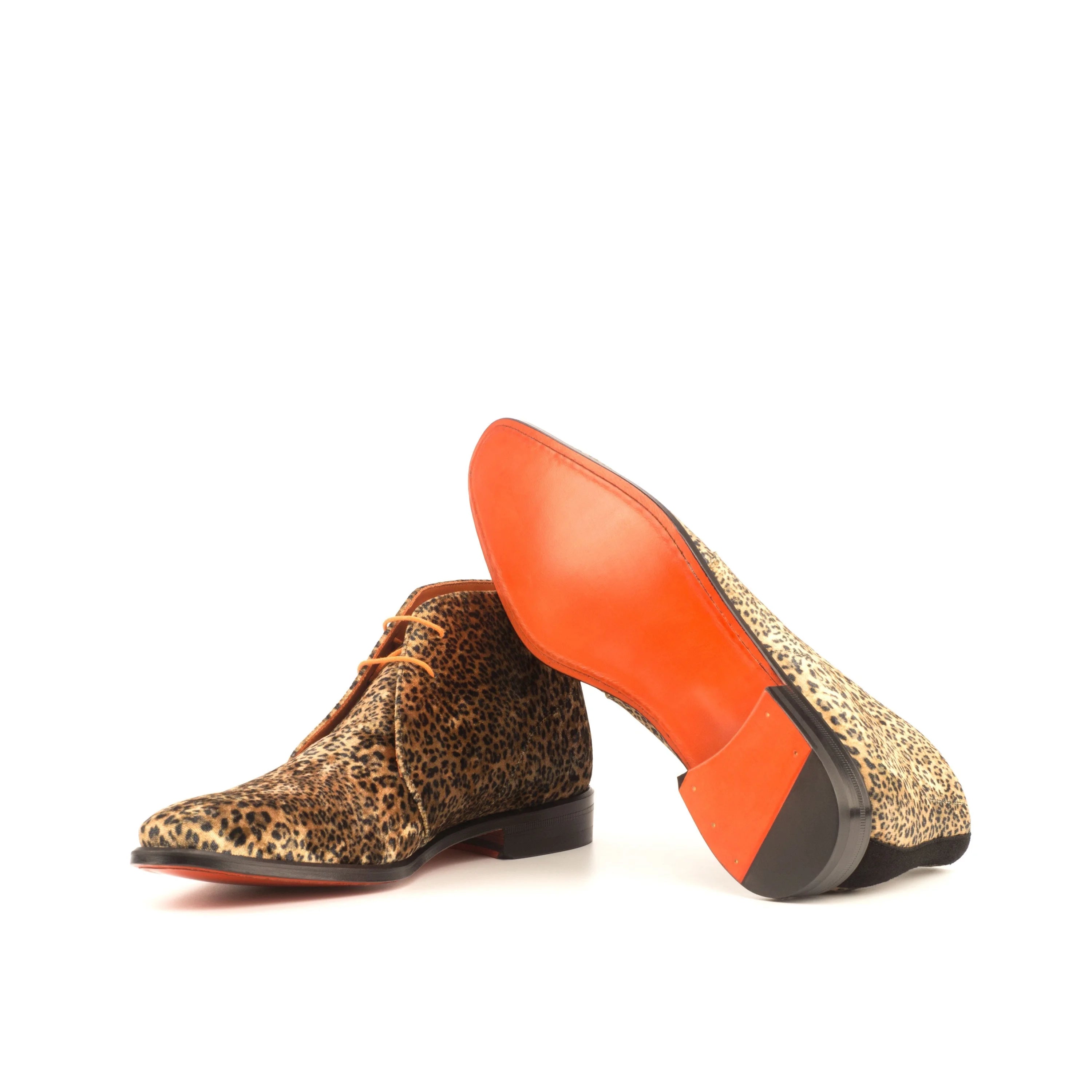 Pardo chukka boots in leopard print with orange soles and black heel caps