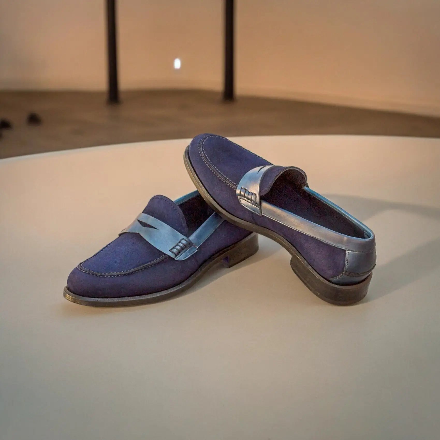 Blue suede loafers.