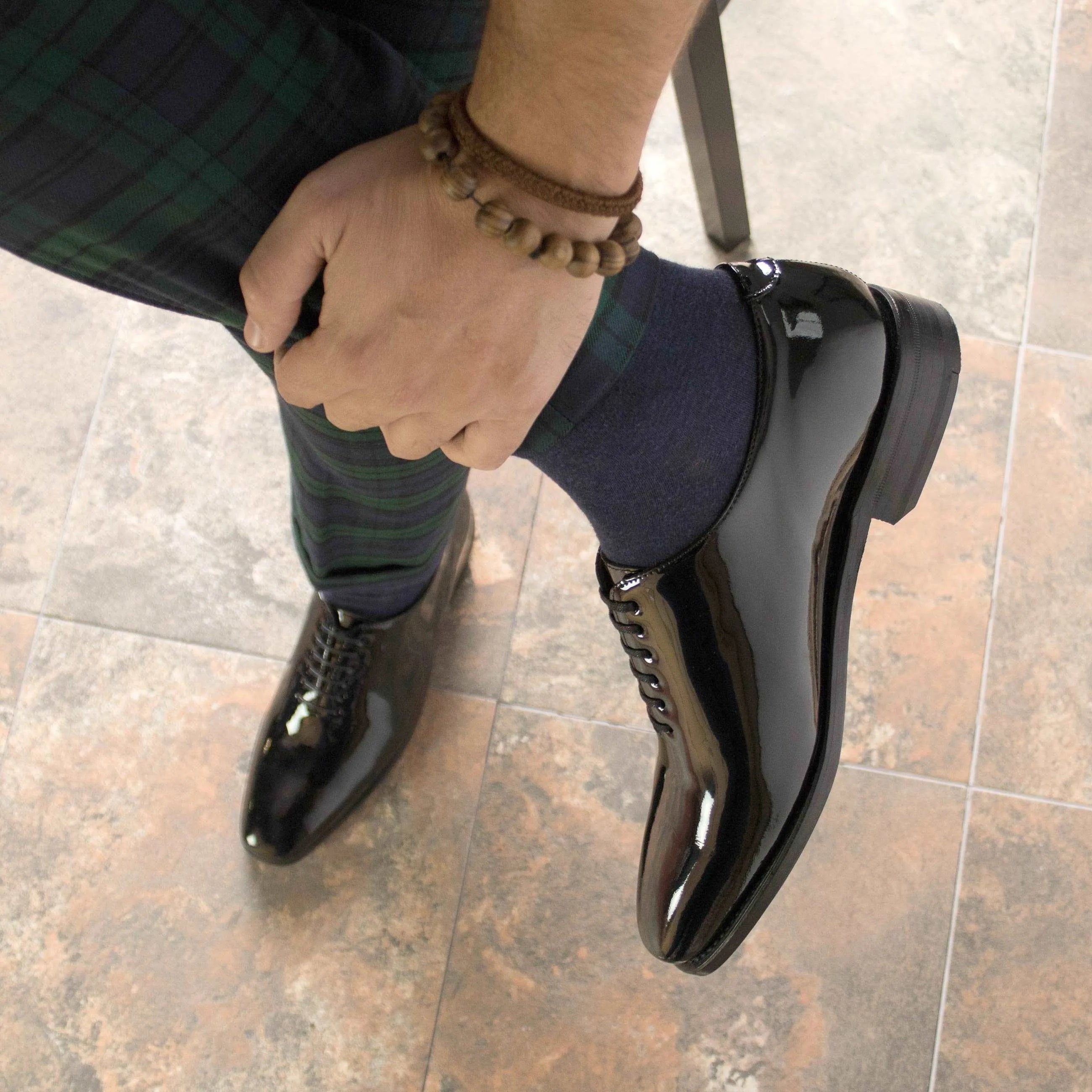 Shiny black Agent2 Wholecut shoes back view