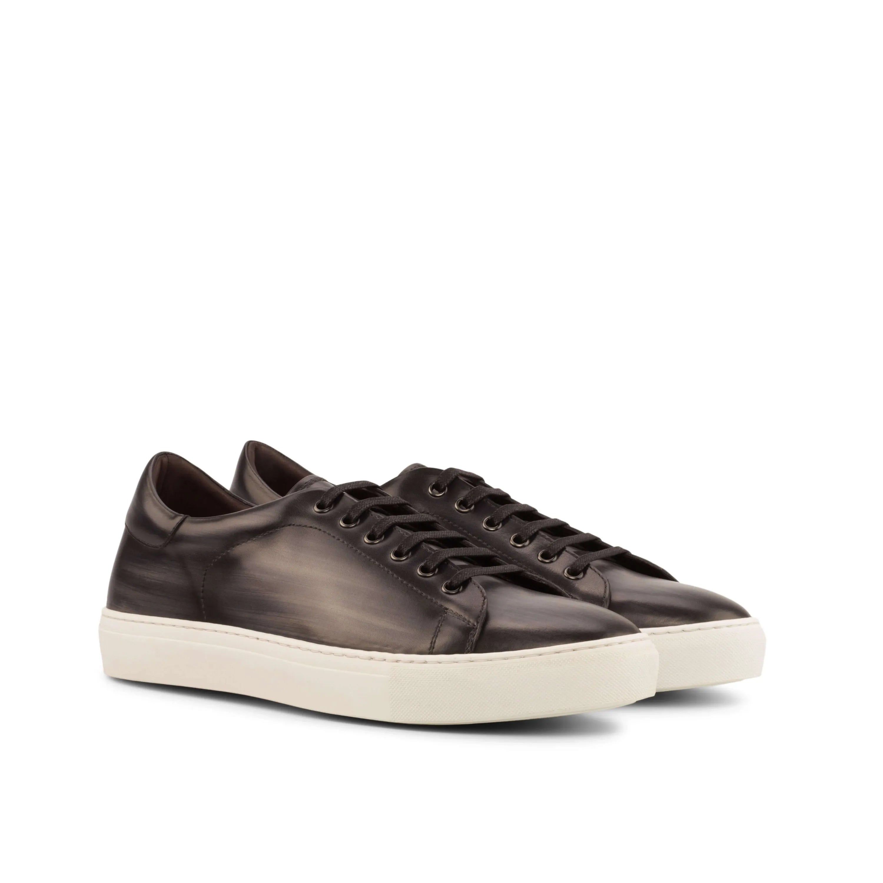 Pair of black leather C68 trainer patina sneakers