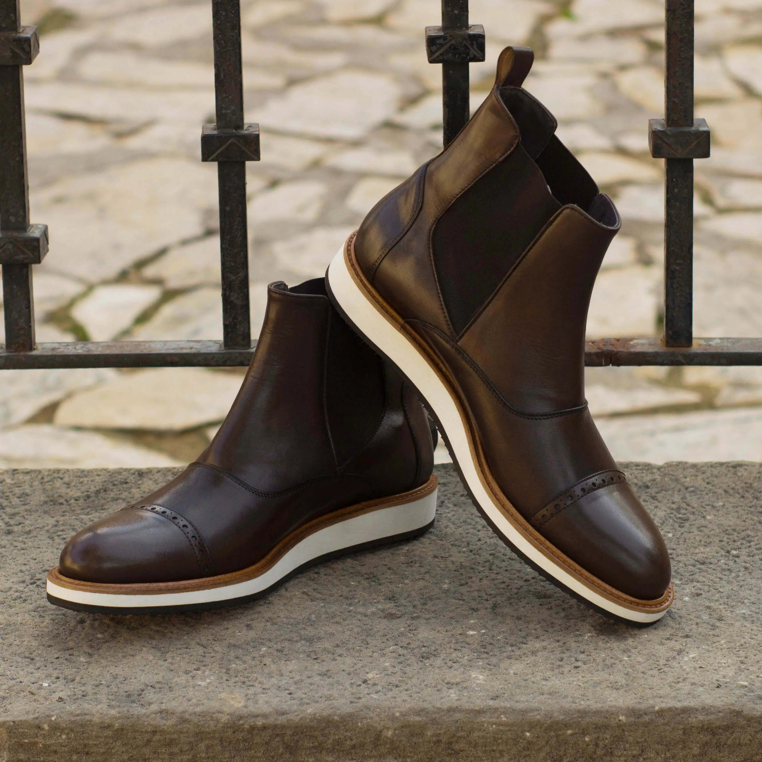 Brown Choovio Chelsea boots in leather, rear view