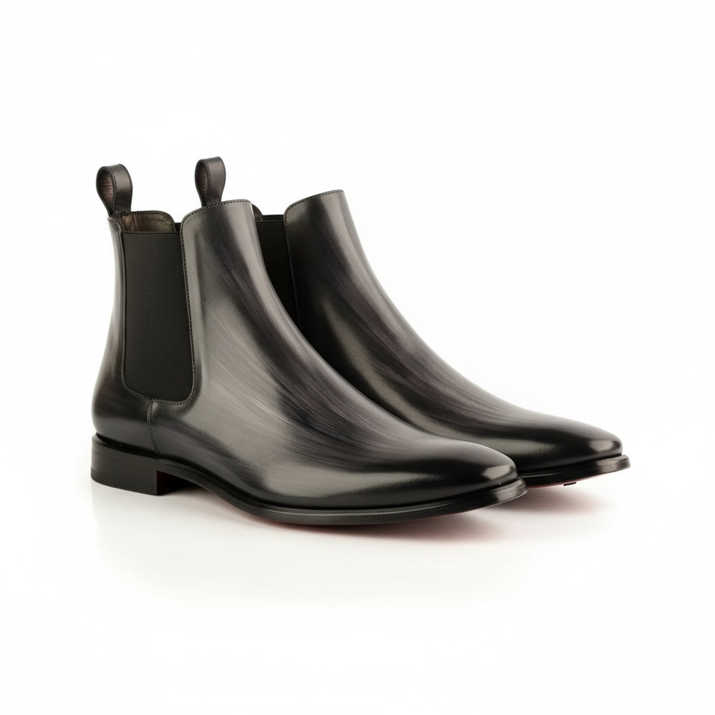 Pair of black leather JT Chelsea patina boots