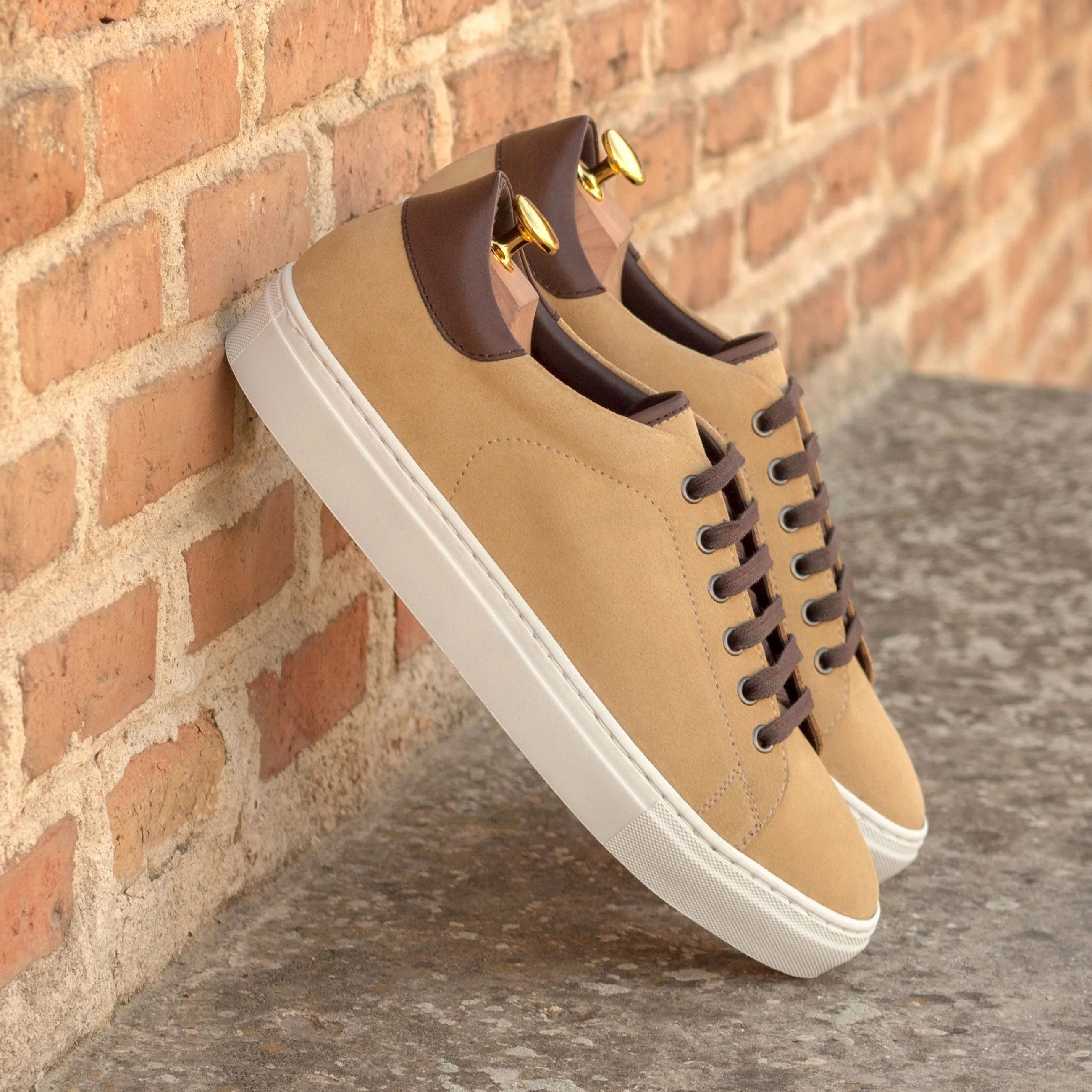 Tan Lordi trainer sneakers with brown accents on cupsole design