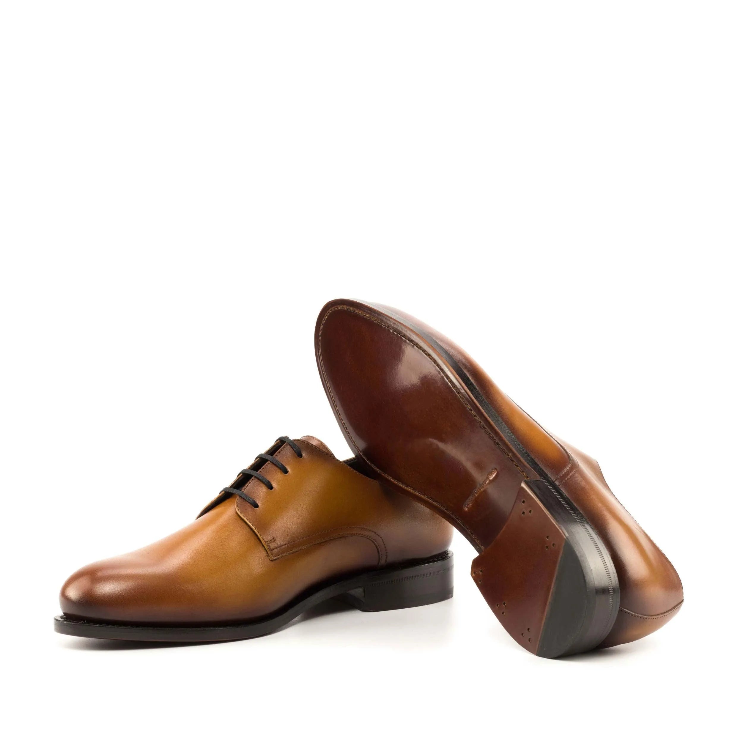 Pair of brown leather Pinardo Derby shoes in fast lane style