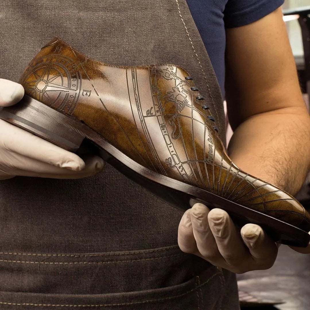 Worldly Patina Wholecut leather dress shoe with map design in Italian crust leather